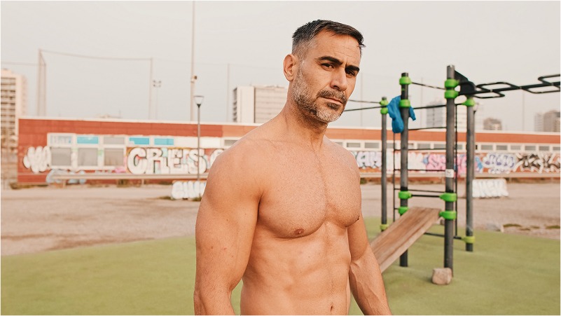 athletic-mature-man-looking-at-camera-while-standi-2024-10-18-03-37-09-utc